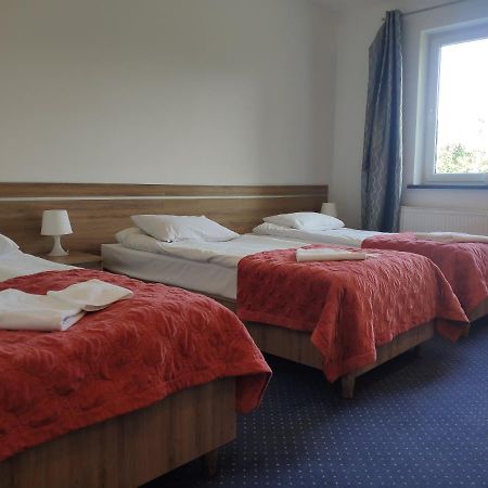 Hotel Eden Rzgow Bagian luar foto